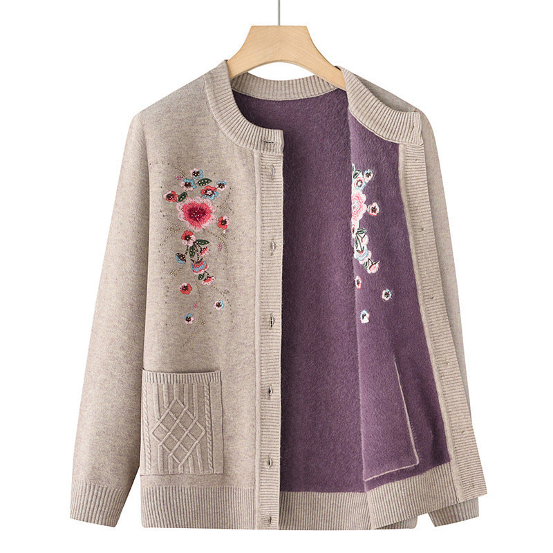 Women's embroidered cardigan with round neckline, decorative button placket, and patch pockets Mune Fashion