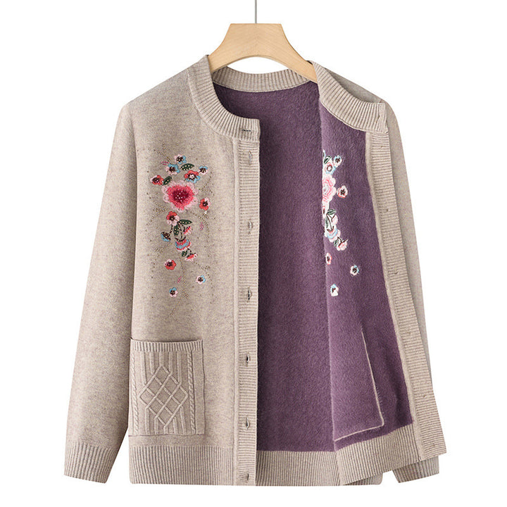 Women's embroidered cardigan with round neckline, decorative button placket, and patch pockets Mune Fashion