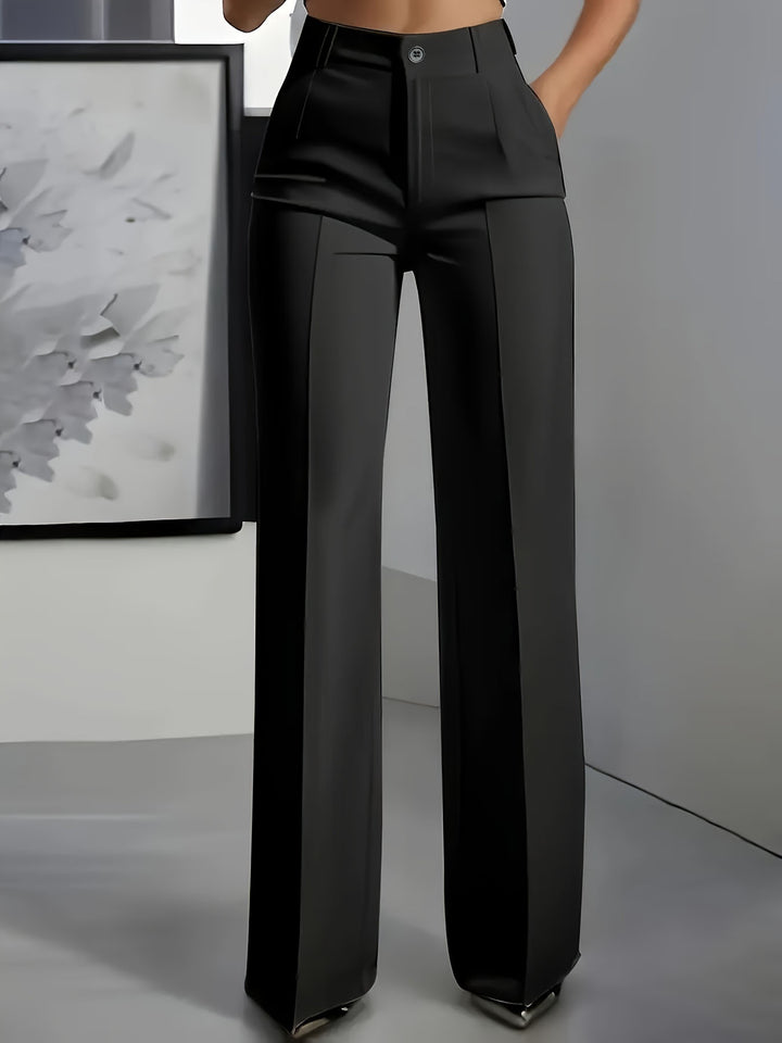 Women's high-waisted pleated trousers with wide leg and crease detail