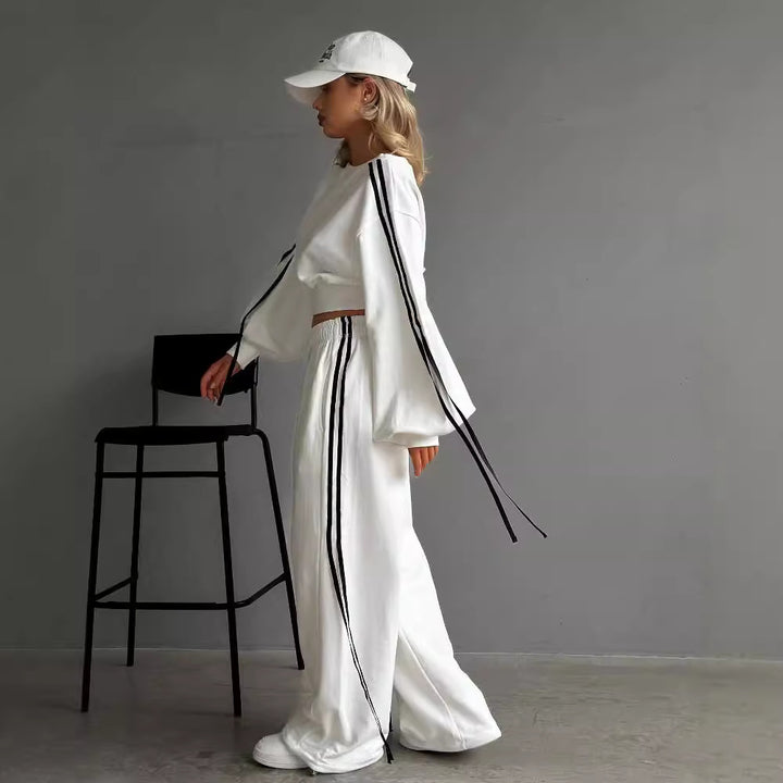 Women's loose Relax leisure pants with drawstring, elastic comfort waistband, and side decorative seams Mune Fashion
