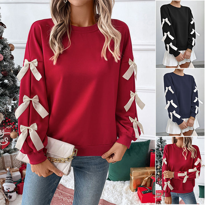 Women's sweatshirt with decorative bows on the sleeves Mune Fashion