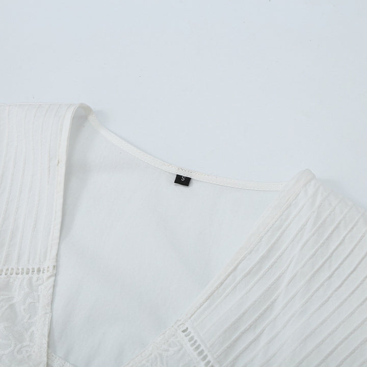 Women's blouse with V-neckline, broderie embroidery, and voluminous puff sleeves Mune Fashion
