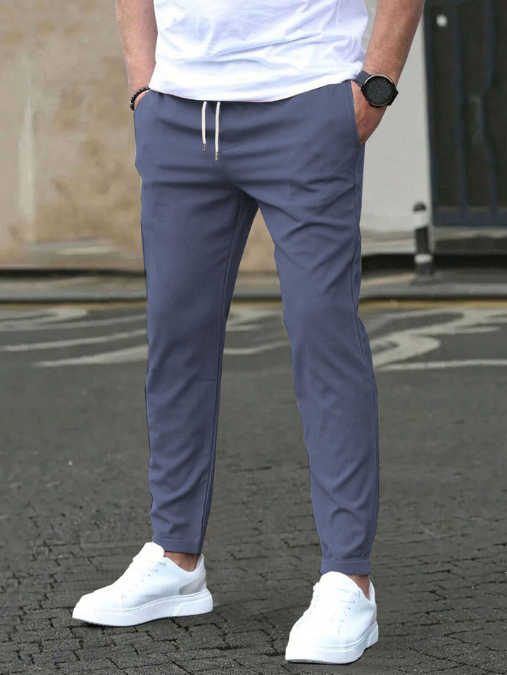 Men's Slim-Fit Jogging Pants with Drawstring, Side Pockets, and Narrow Ankle Hem Mune Fashion
