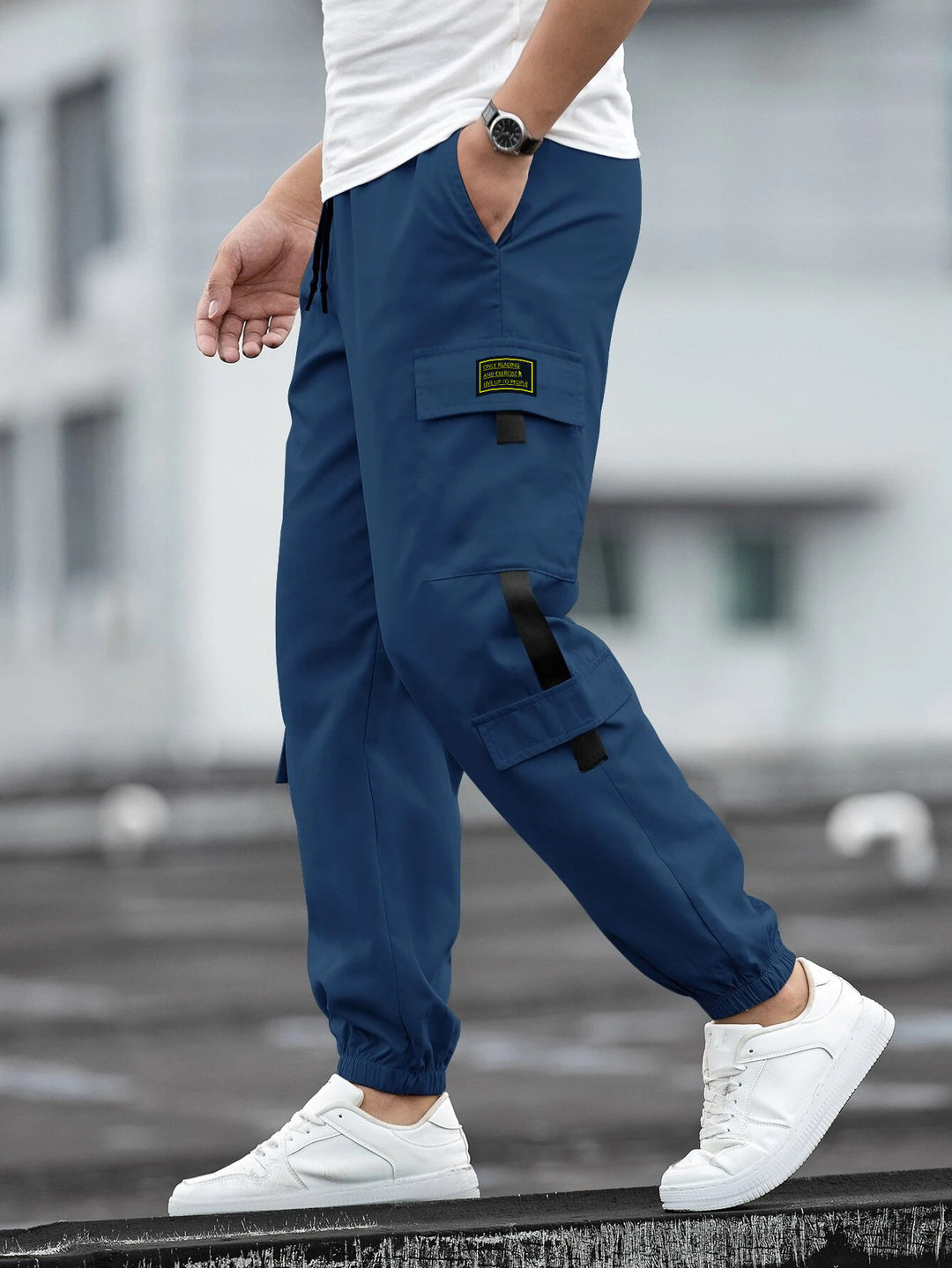 Men's fashionable cargo jogger pants with elastic waistband, drawstring, and multiple security and flap pockets Mune Fashion