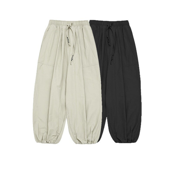 Unisex balloon pants with drawstring, elastic cuffs and relaxed fit Mune Fashion