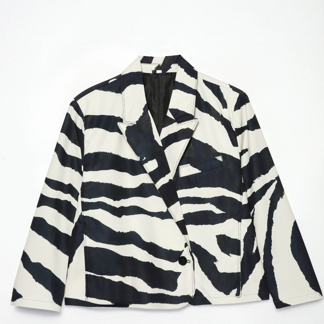 Women's oversized zebra print blazer with shawl collar, single button closure, and patch pockets Mune Fashion
