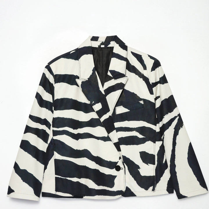 Women's oversized zebra print blazer with shawl collar, single button closure, and patch pockets Mune Fashion