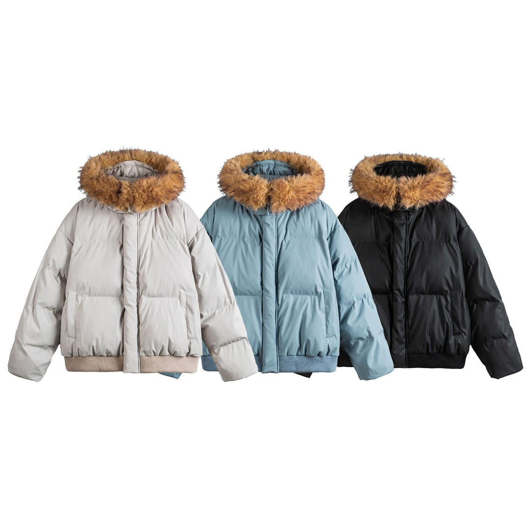 Women's short cropped quilted jacket with faux fur hood and elastic hem Mune Fashion