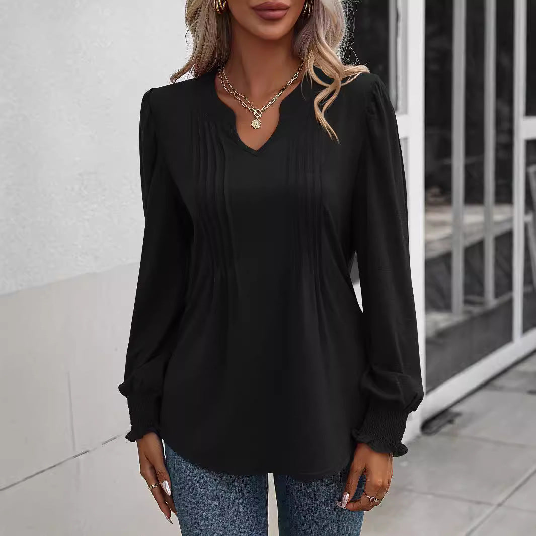 Women's long sleeve shirt with V-neckline, decorative inverted pleats at the front and elastic smocked cuffs Mune Fashion