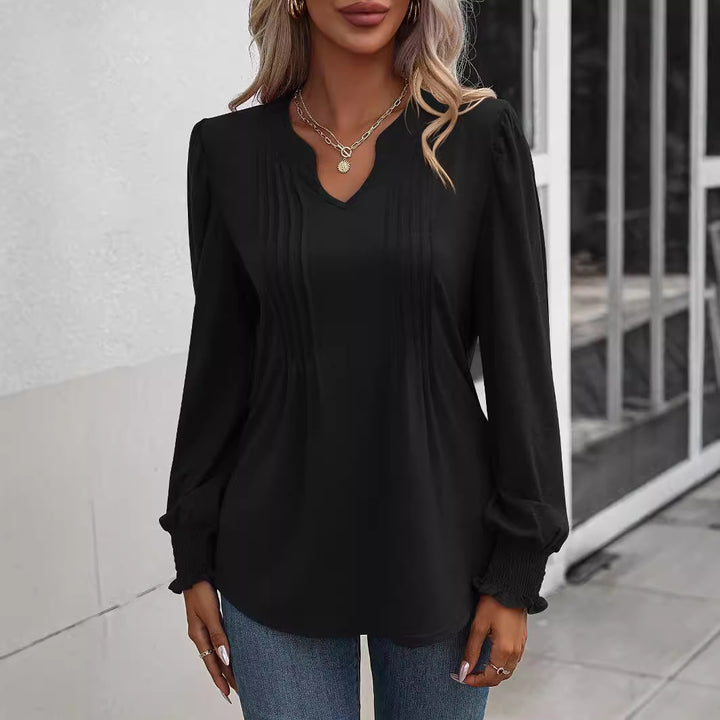 Women's long sleeve shirt with V-neckline, decorative inverted pleats at the front and elastic smocked cuffs Mune Fashion