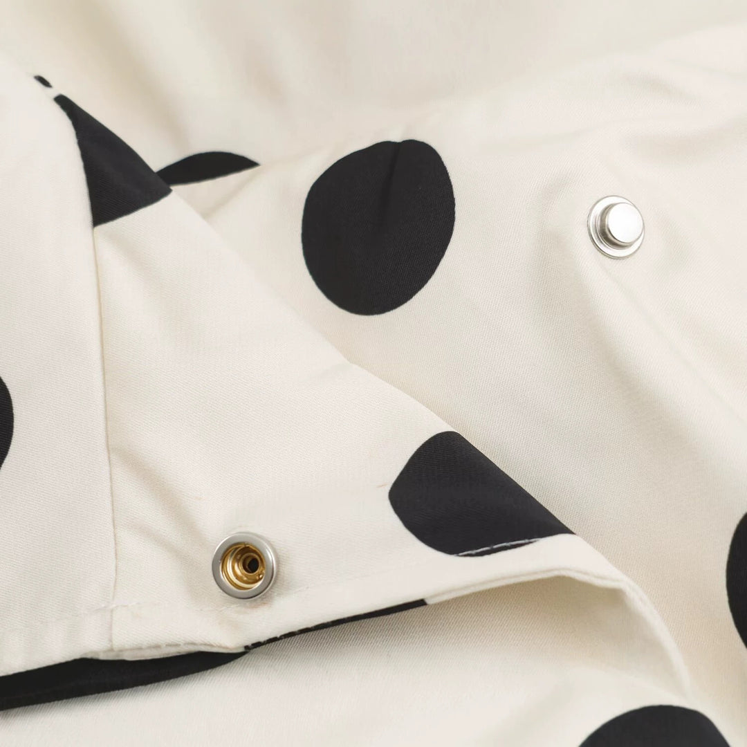 Women's lightweight dotted rain jacket in oversized cropped cut with high funnel collar Mune Fashion