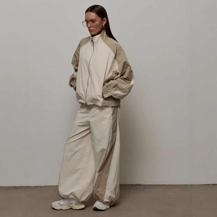Women's oversized sporty track jacket with high stand-up collar and raglan sleeves Mune Fashion