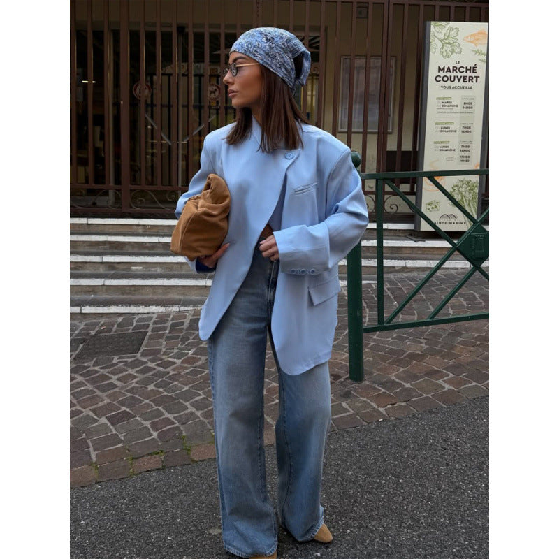 Women’s oversized long blazer with boxy silhouette, soft shoulders, and extended cut.