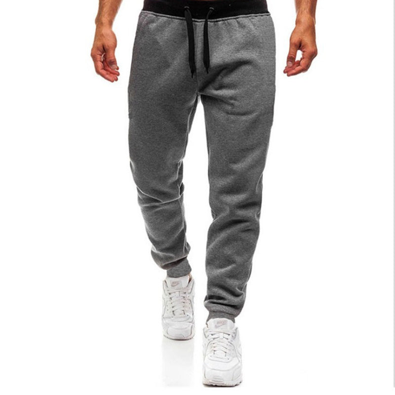 Men's tapered joggers with elastic comfort waistband, adjustable drawstring, integrated side pockets, and ribbed ankle cuffs Mune Fashion