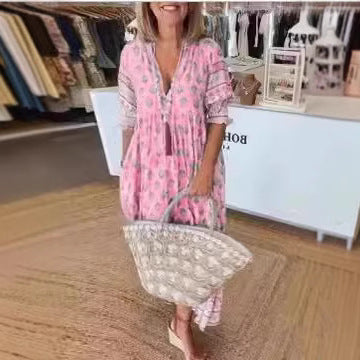 Women Boho Maxi Dress made of lightweight viscose blend with V-neck, tassel tie, three-quarter sleeves, and side pockets Mune Fashion