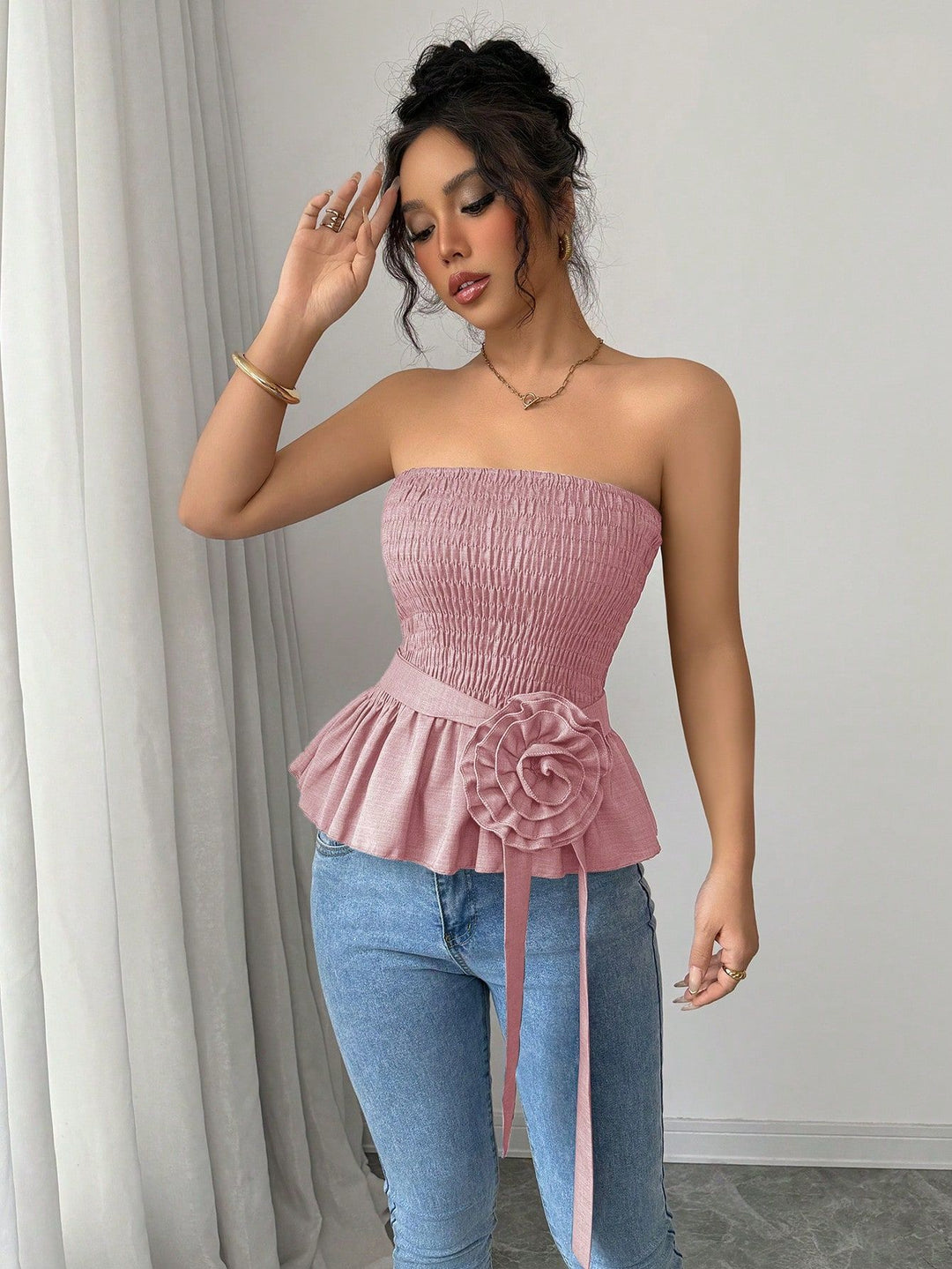 Women's fitted strapless Smok top with ruffle peplum and decorative fabric flower Mune Fashion
