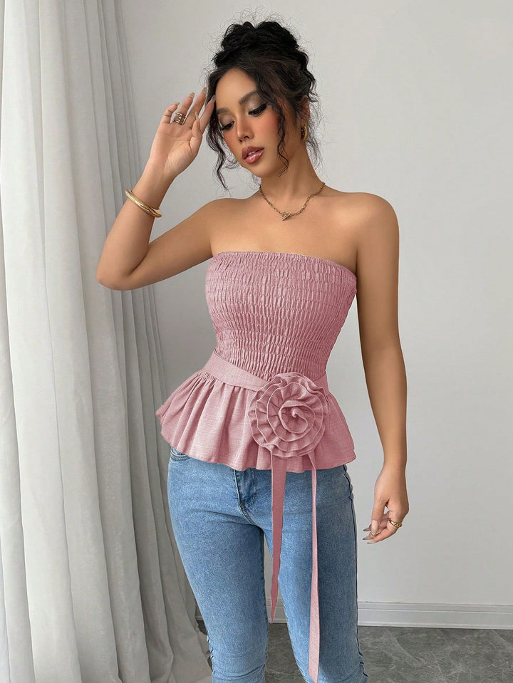 Women's fitted strapless Smok top with ruffle peplum and decorative fabric flower Mune Fashion