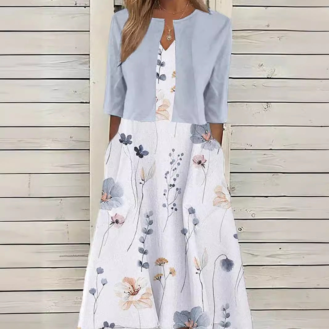 Women's midi dress with bolero look, fitted V-neck, three-quarter sleeves, and floral A-line skirt Mune Fashion
