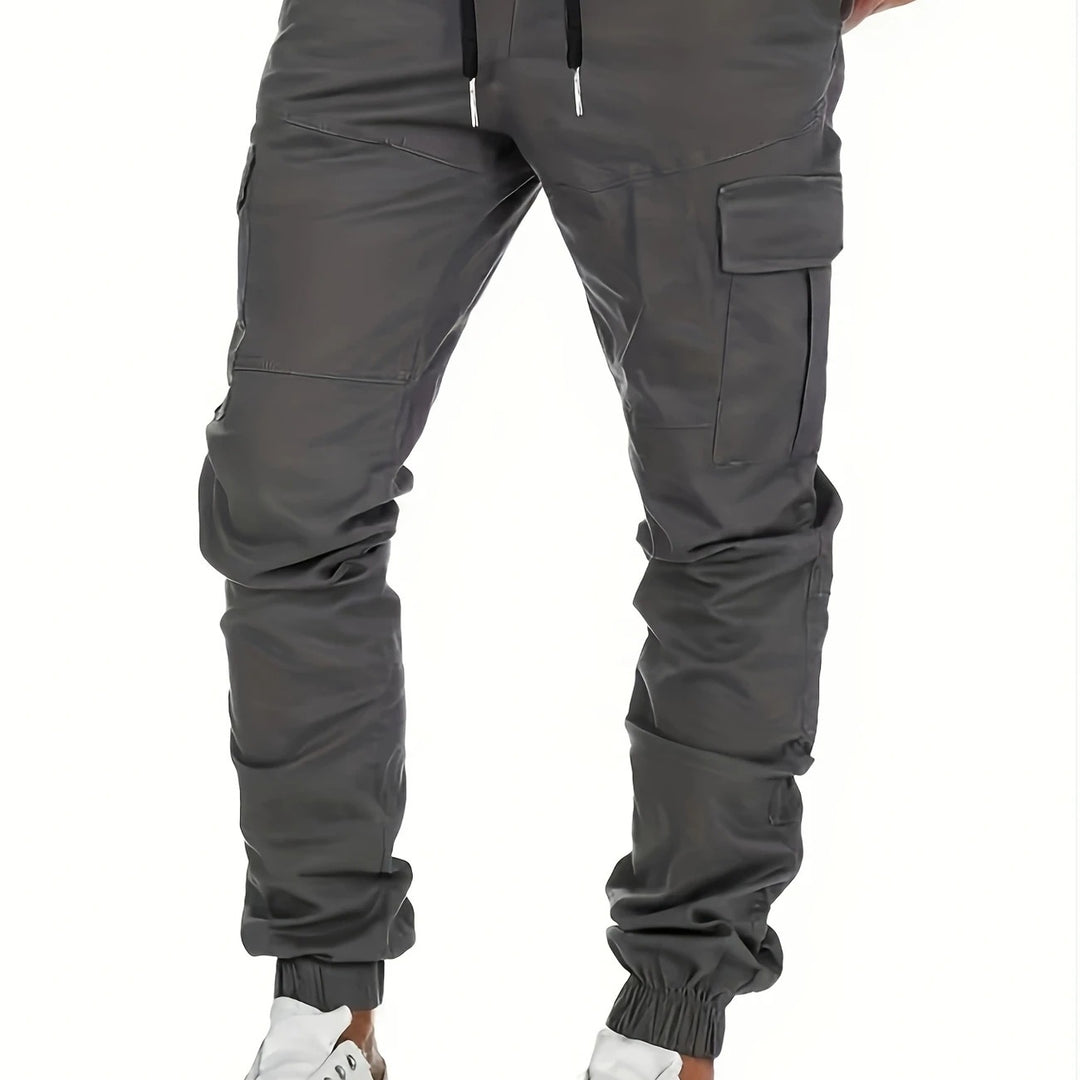 Men's cargo joggers with drawstring, elastic cuffs, and large flap pockets Mune Fashion