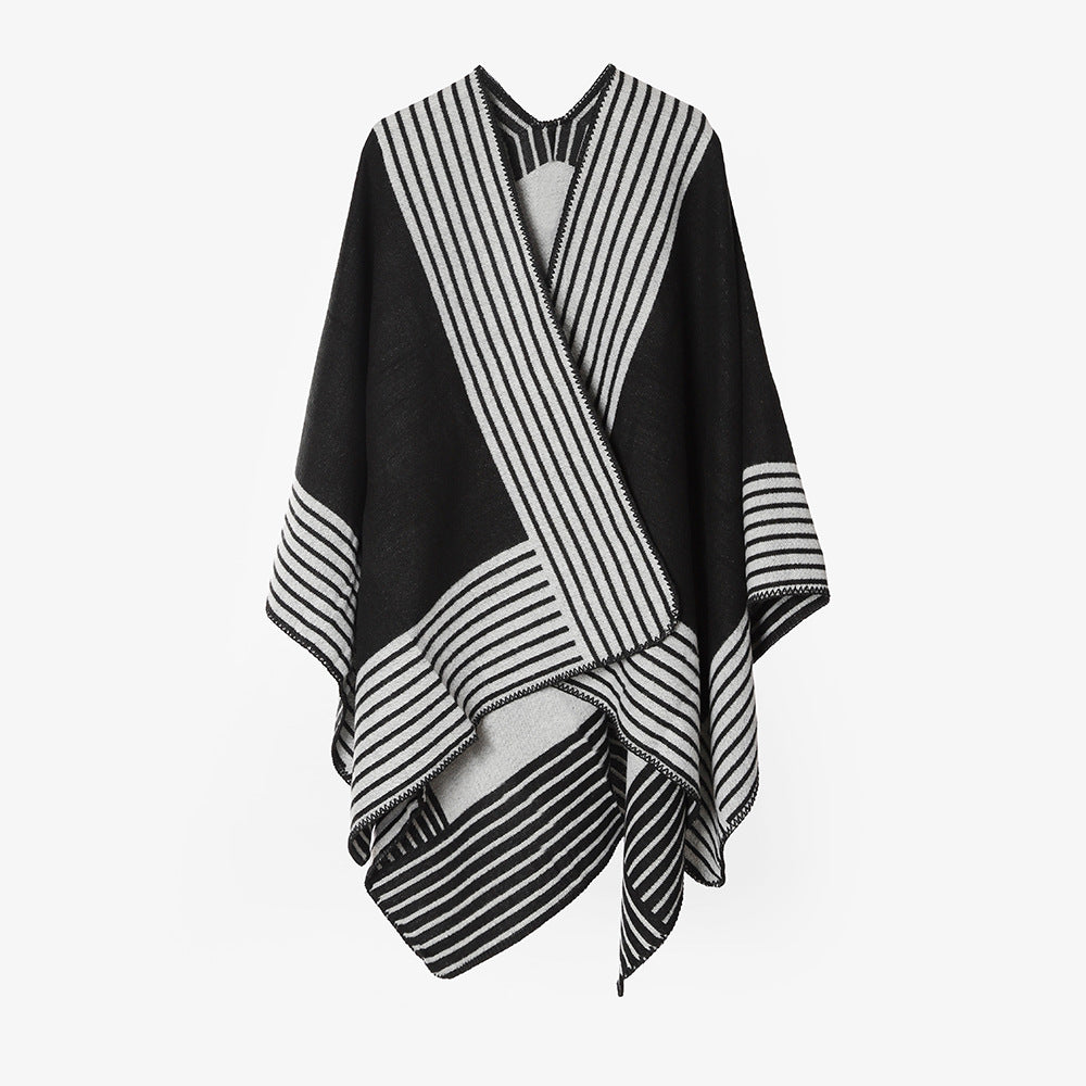 Women's knit poncho made of wool blend with striped jacquard and asymmetrical pointed hem Mune Fashion
