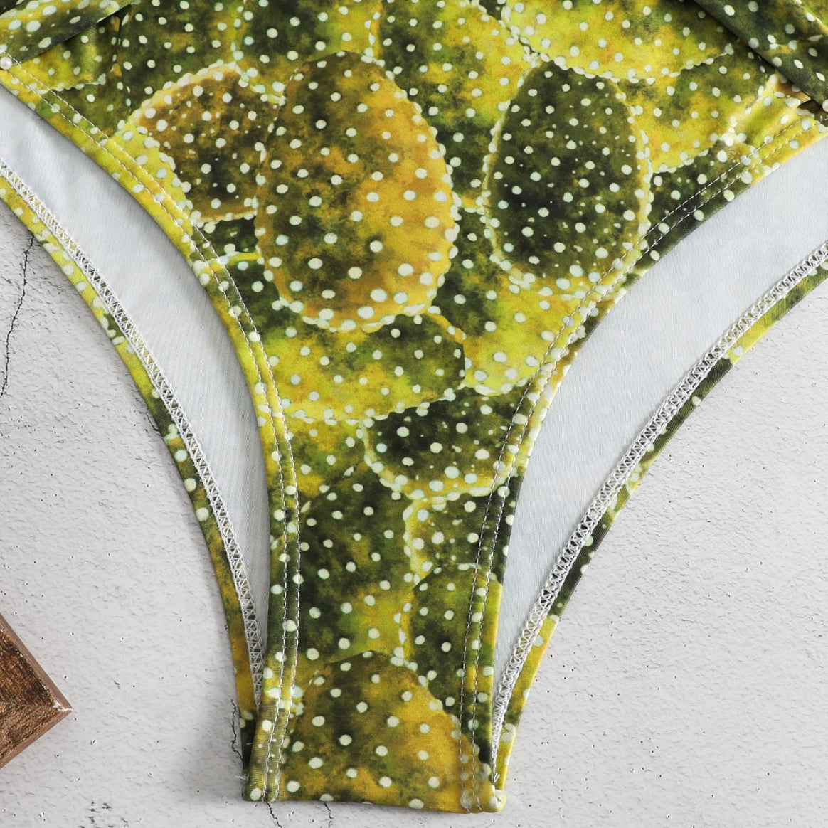 Women's one-piece swimsuit with playful knot design and floral pattern Mune Fashion