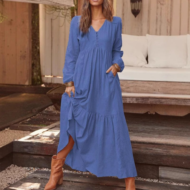 Women's airy maxi dress with V-neck, long sleeves, and side pockets Mune Fashion