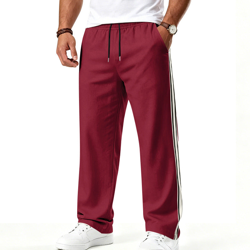 Men's loose-fitting training pants with double side stripes and elastic waistband Mune Fashion