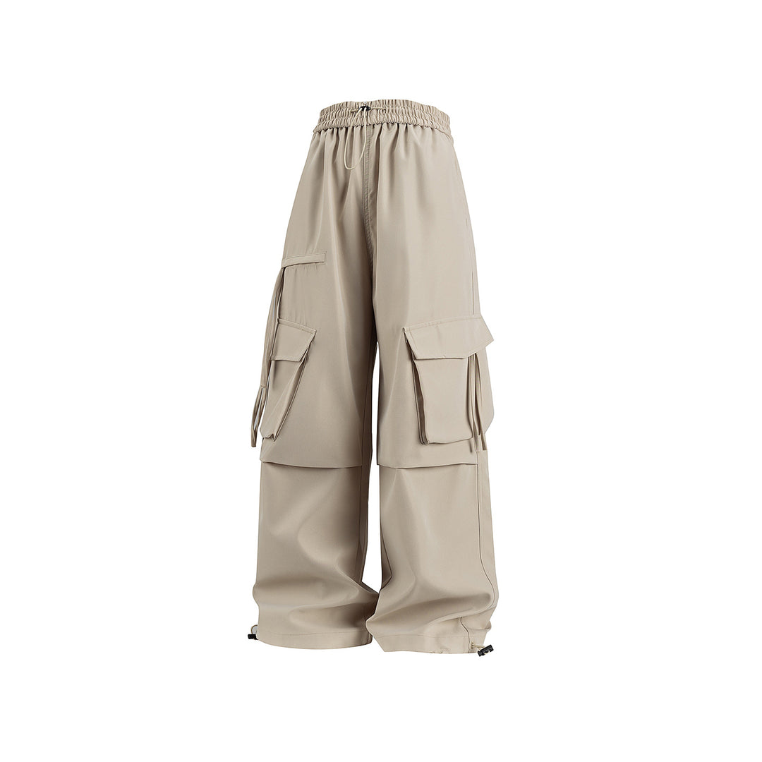 Damen Weite Cargo‑Hose im Baggy‑Cut mit elastischem Tunnelzugbund, Klapp‑Utility‑Taschen und verstellbarem Beinabschluss Mune Fashion