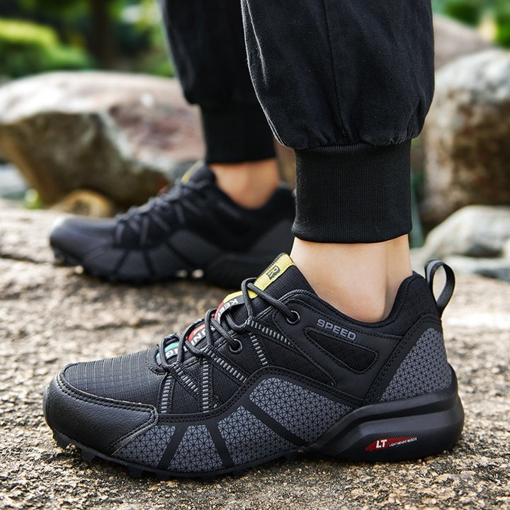 Men's robust trail running and outdoor sneaker with grippy multi-terrain profile sole, reinforced toe cap, and bungee lacing Mune Fashion