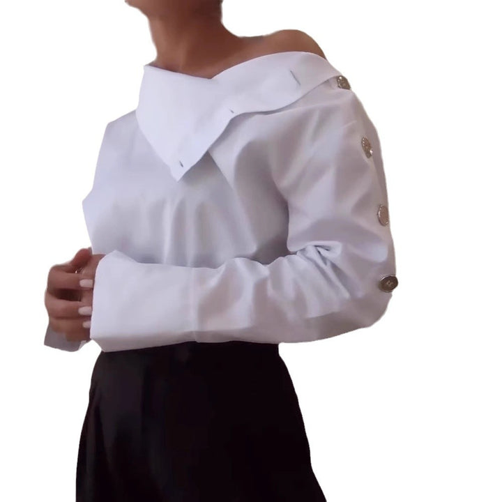 Women high-neck blouse with decorative shoulder buttons and flared cuffs Mune Fashion
