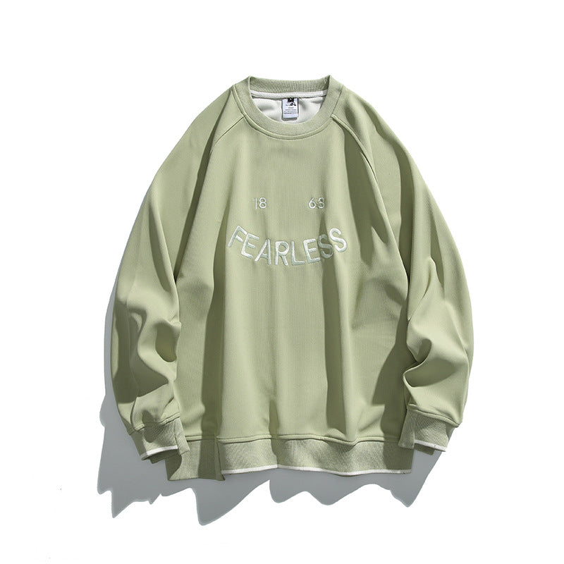 Unisex Oversize Sweatshirt with raglan sleeves and distinctive FEARLESS front print Mune Fashion