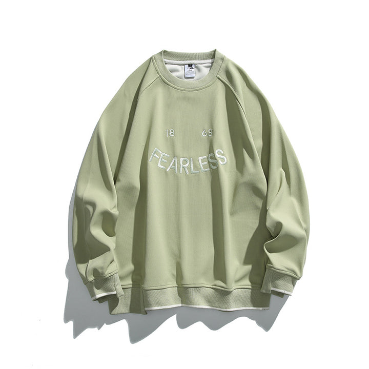 Unisex Oversize Sweatshirt with raglan sleeves and distinctive FEARLESS front print Mune Fashion