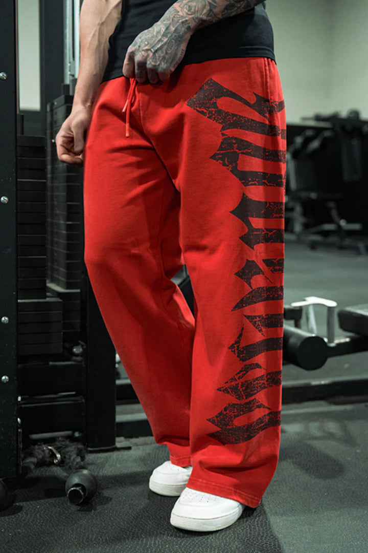 Men's wide sweatpants made of brushed fleece with side vintage print and drawstring waistband Mune Fashion