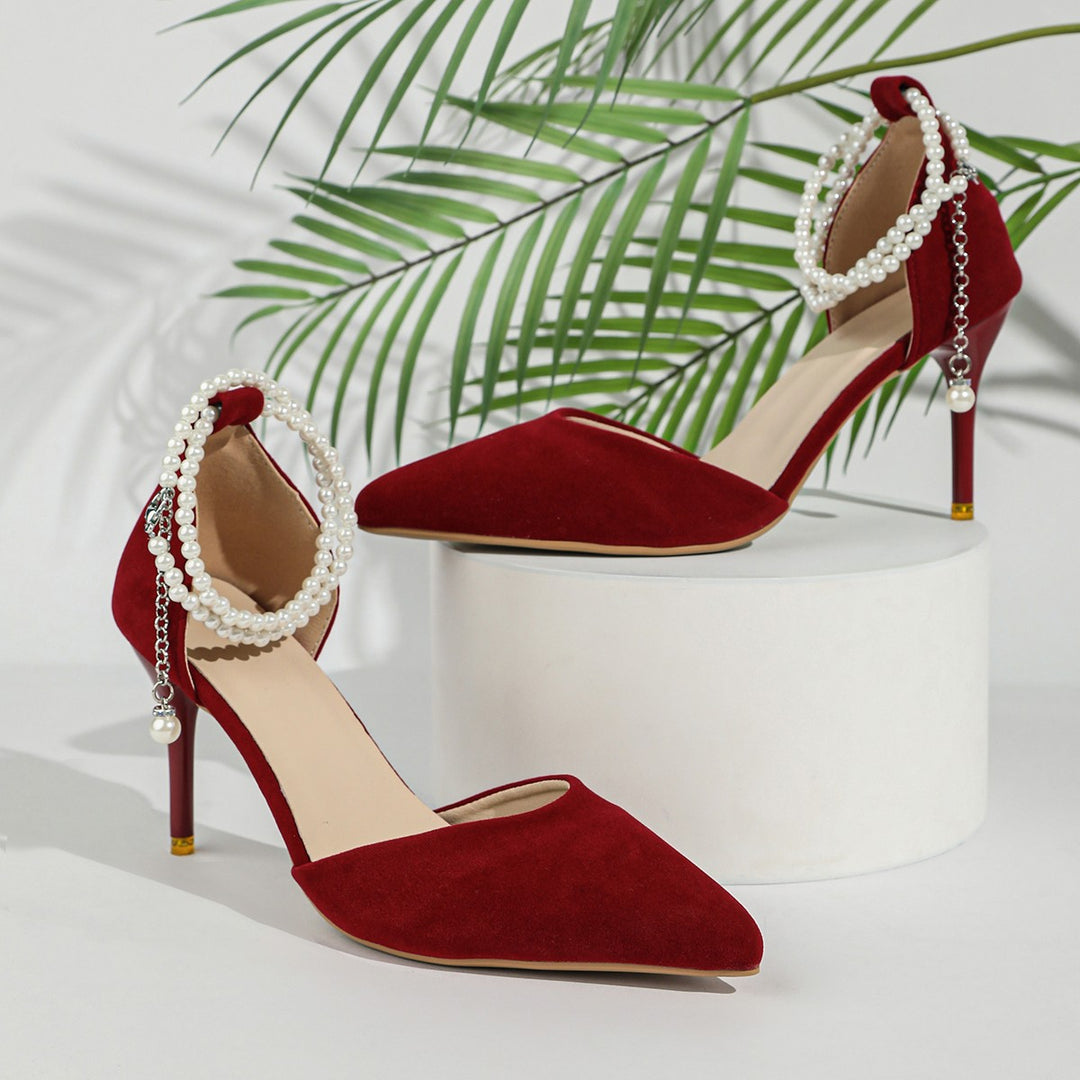 Women Elegant pointed heels with pearl ankle straps and slim stiletto heel