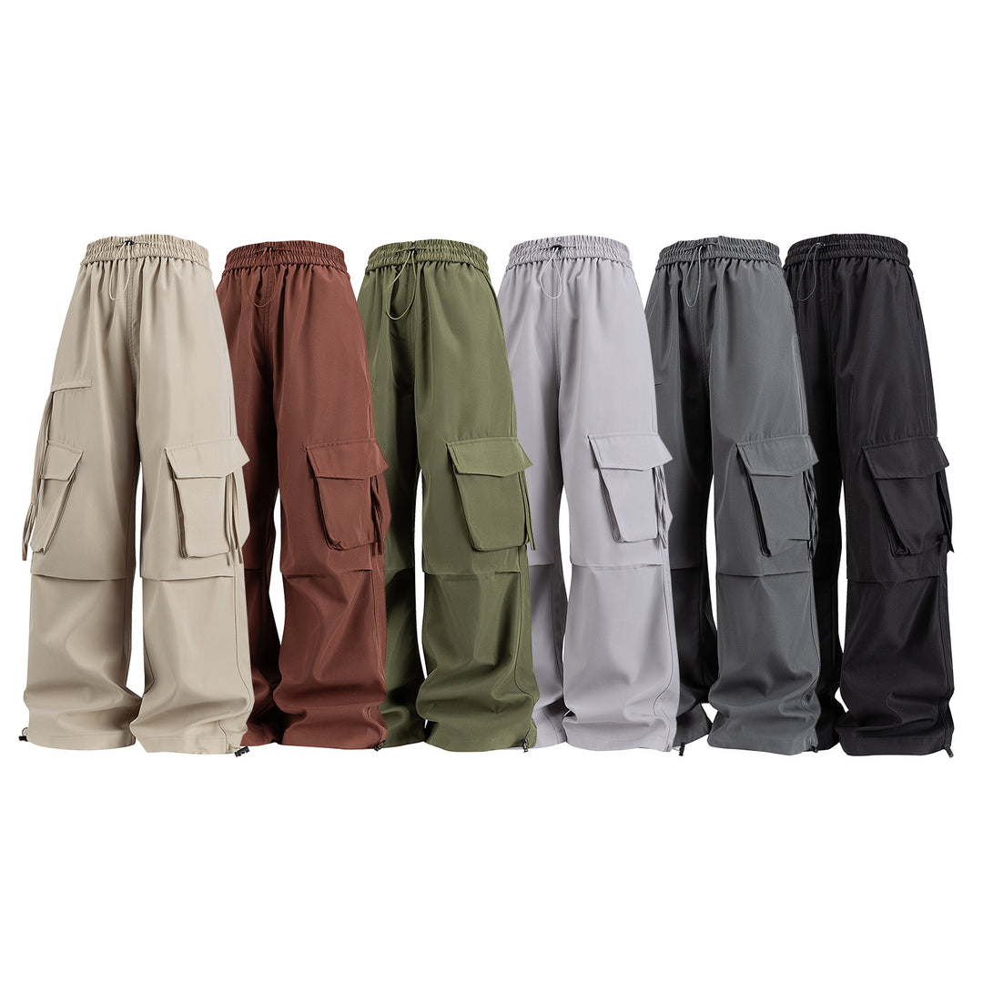 Damen Weite Cargo‑Hose im Baggy‑Cut mit elastischem Tunnelzugbund, Klapp‑Utility‑Taschen und verstellbarem Beinabschluss Mune Fashion