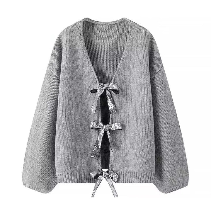 Women nan Oversize knit cardigan with deep V-neck and decorative sequin bows Mune Fashion