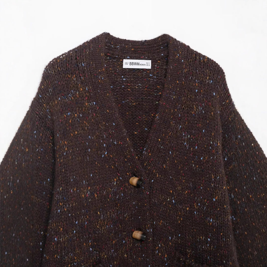 Women’s chunky knit cardigan with horn button front and patch pockets Mune Fashion