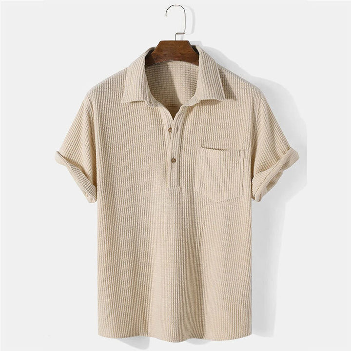 Men's waffle knit polo with shirt collar, short button placket and chest pocket Mune Fashion