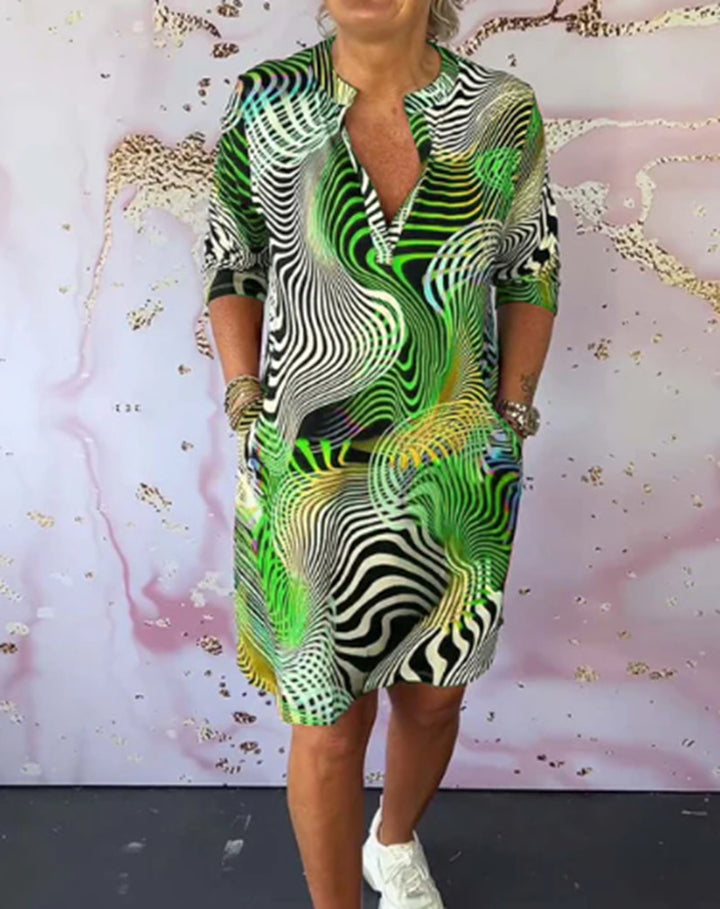 Women’s midi dress with psychedelic all-over print V-neck and casual shift fit Mune Fashion