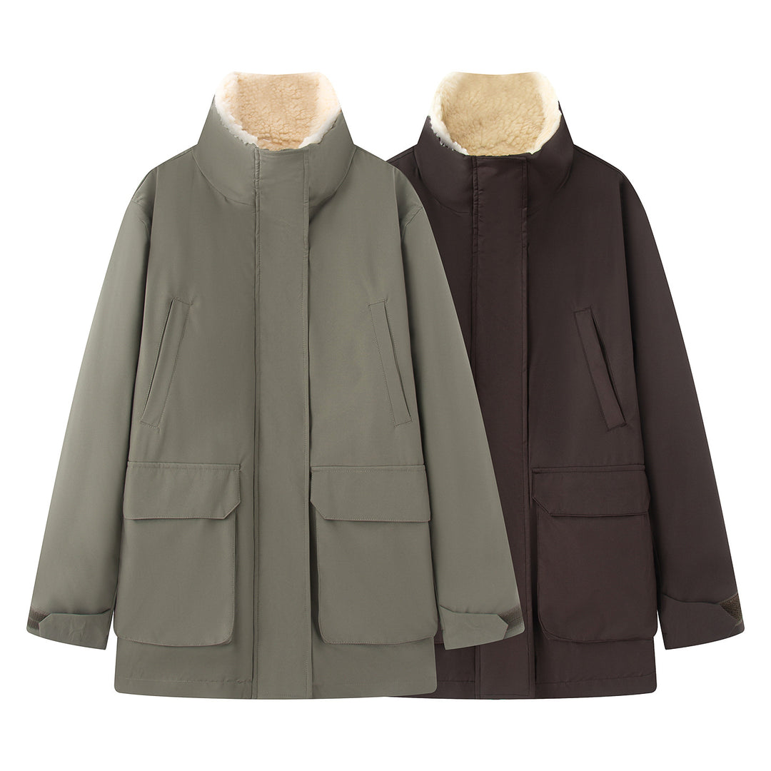 Women's oversized parka with high teddy-lined stand collar, concealed front placket and large flap pockets Mune Fashion