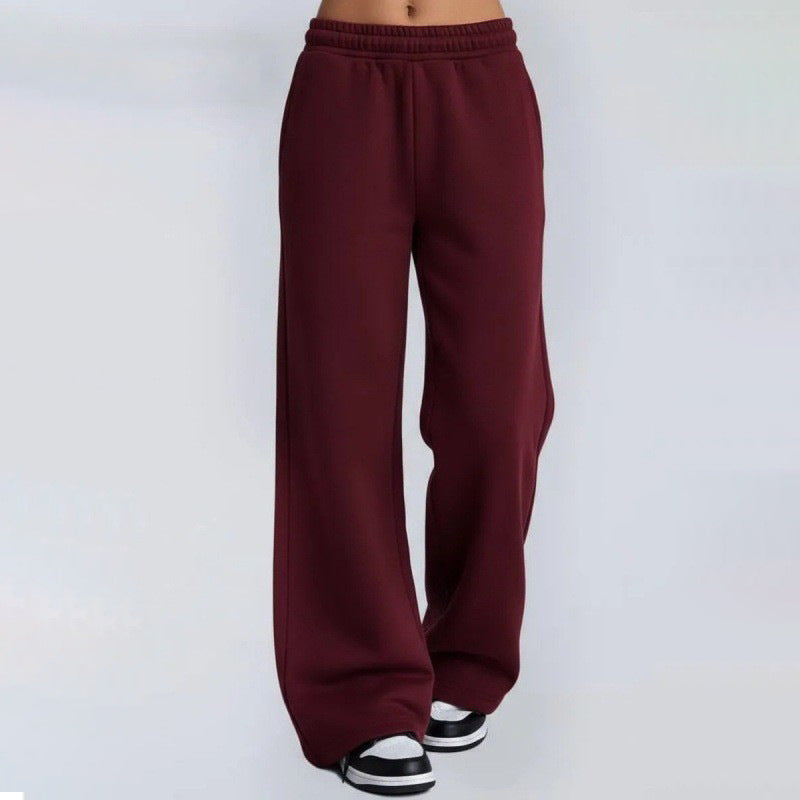 Women's flowing palazzo lounge pants with extra wide leg, elastic comfort waistband, and discreet side pockets Mune Fashion