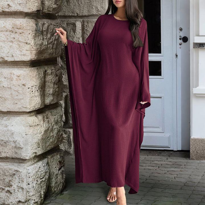 Women's flowing max dress with wide draped sleeves made of viscose blend Mune Fashion