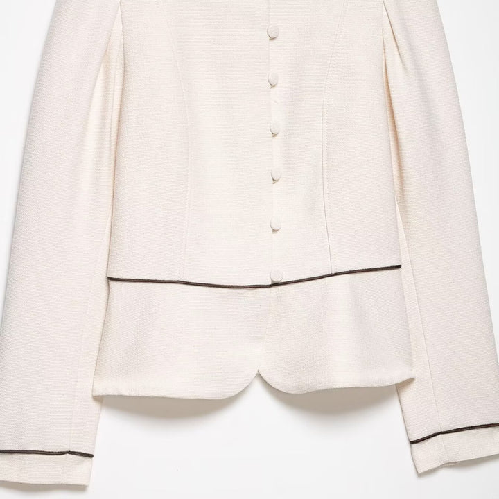 Ladies short blazer in bouclé look with stand-up collar, decorative piping and covered buttons Mune Fashion