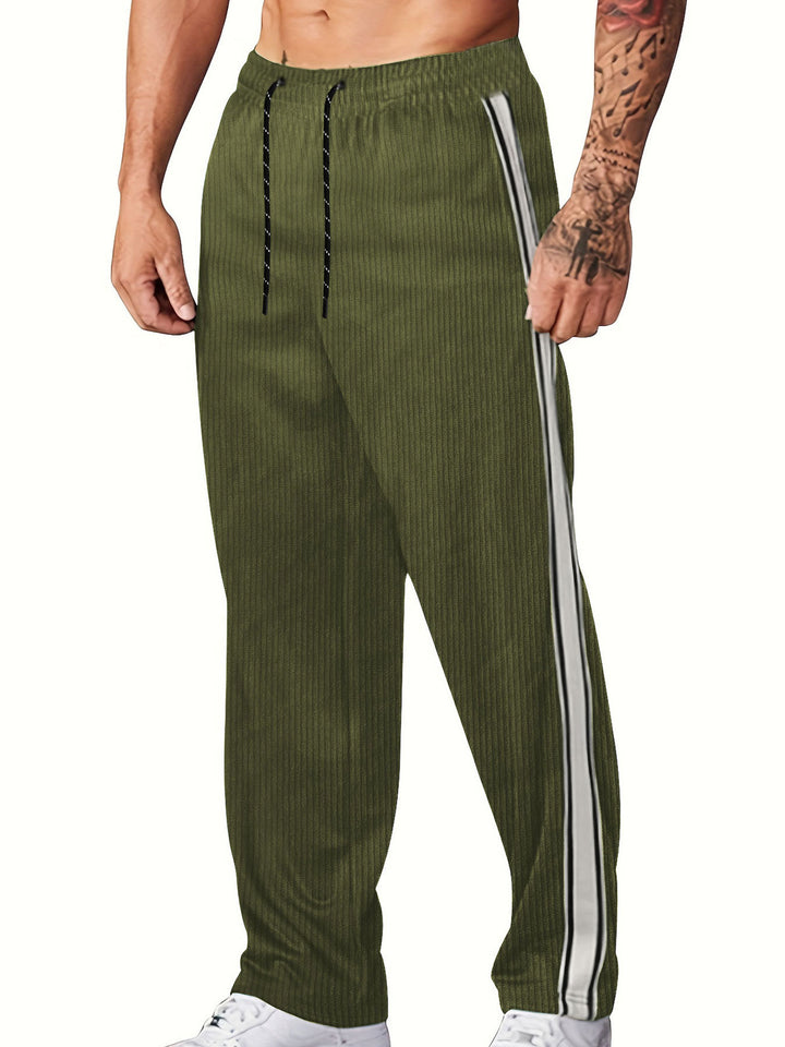 Men's knitted relaxed joggers with wide leg, side piping, and elastic drawstring waistband Mune Fashion