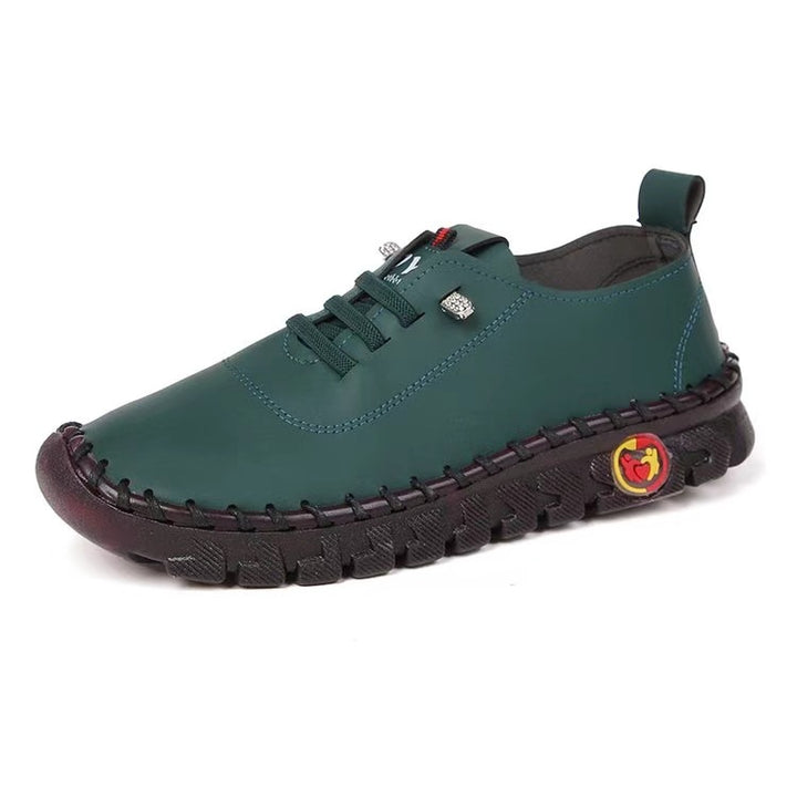 Women's hand-sewn moccasin loafers with elastic lacing, padded comfort insole, and patterned rubber sole Mune Fashion