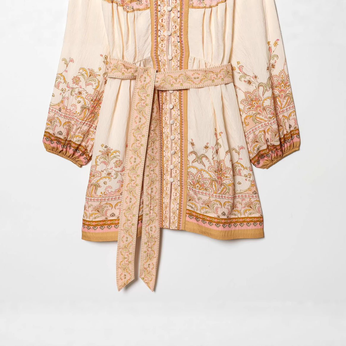 Women's embroidered Boho mini dress with deep V-neck, continuous button placket, figure-flattering tie belt, and balloon sleeves Mune Fashion