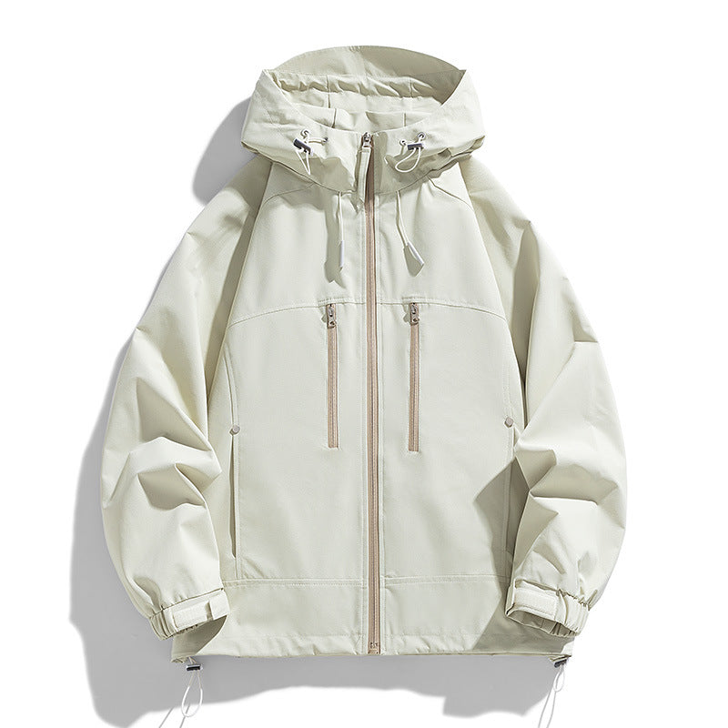 Unisex lightweight water-repellent hoodie jacket with two vertical zip chest pockets and adjustable hem Mune Fashion