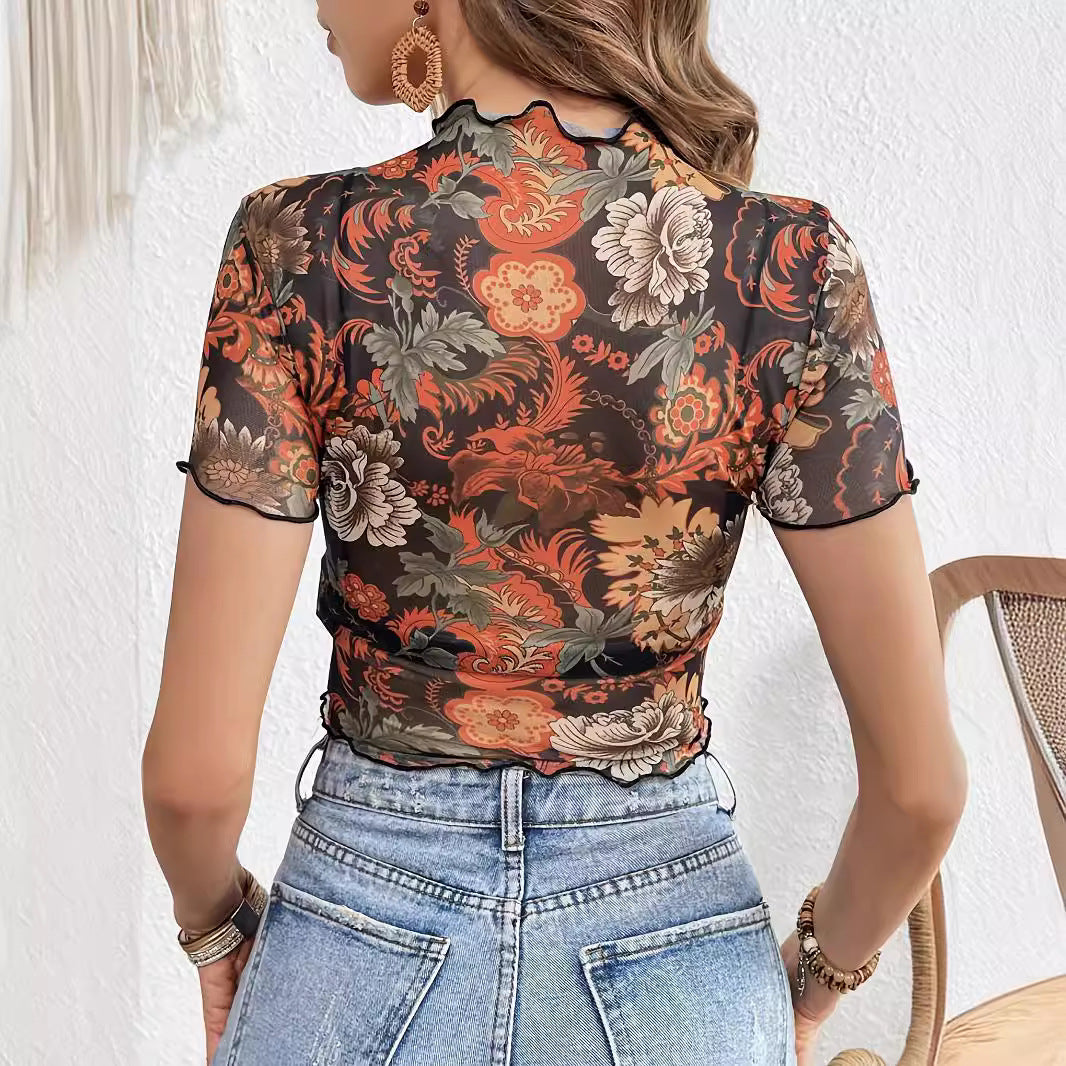 Women's cropped mesh top with semi-transparent floral pattern, stand-up collar, and wavy hem Mune Fashion