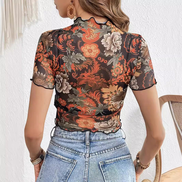 Women's cropped mesh top with semi-transparent floral pattern, stand-up collar, and wavy hem Mune Fashion