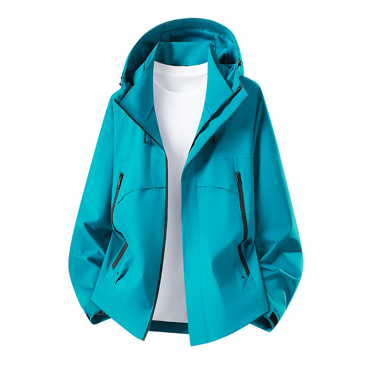 Women's lightweight waterproof hooded jacket with breathable coating, zippered pockets, and adjustable cuffs Mune Fashion